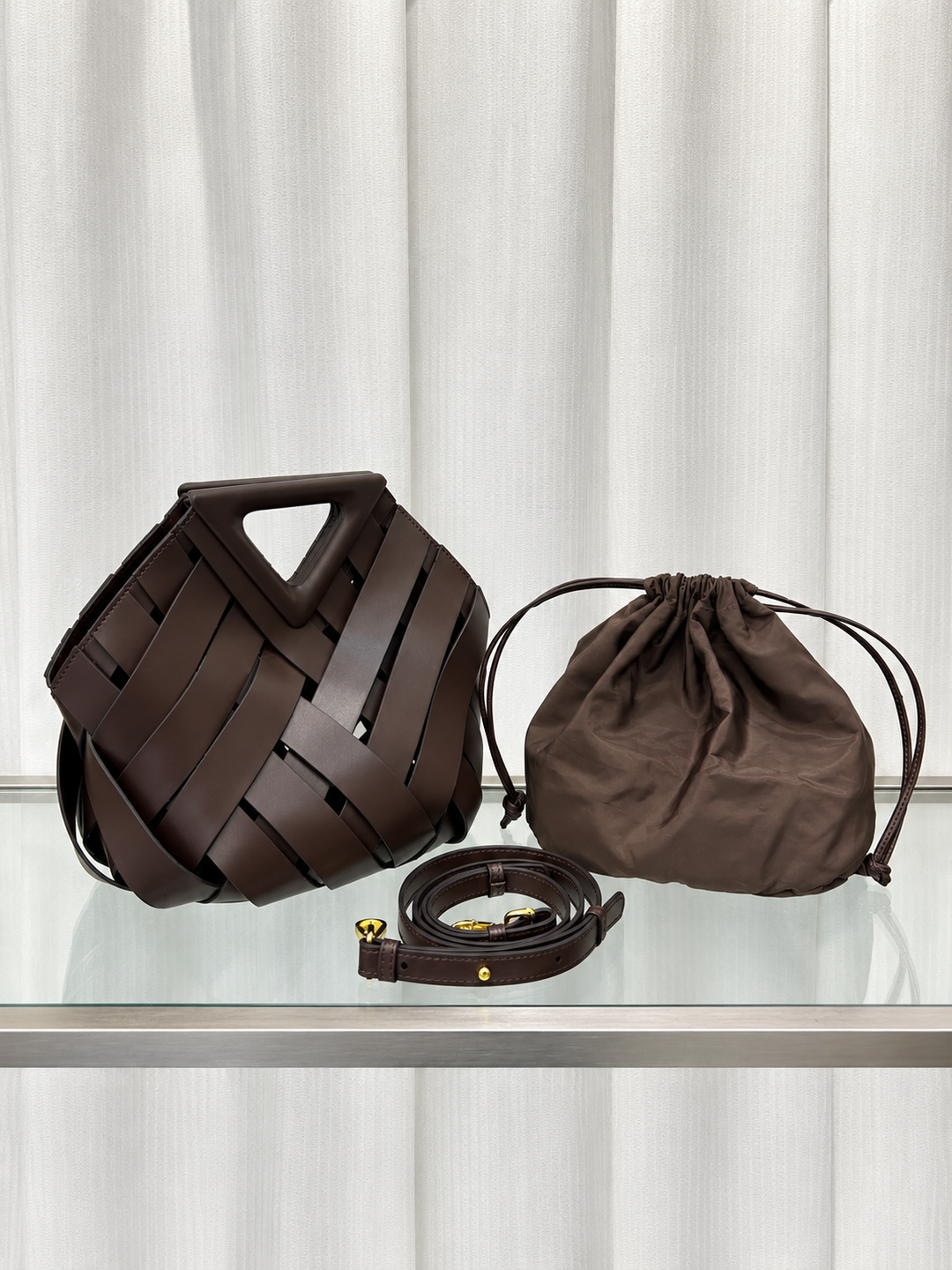 Woven Leather Bucket Bag with Triangle Magnetic Clasp